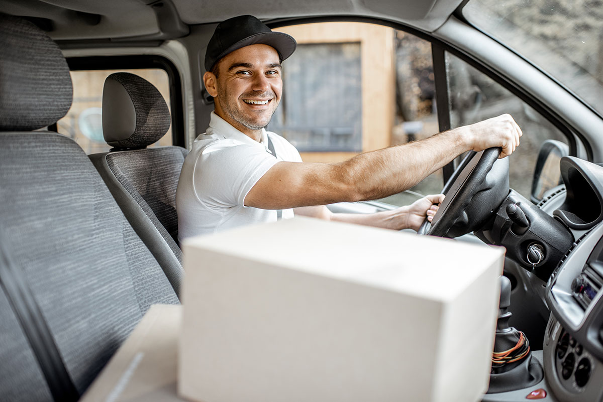 Driver delivering goods by vehicle